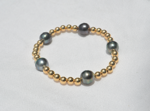 
            
                Load image into Gallery viewer, 5 Tahitian Beaded Stretch Bracelet
            
        
